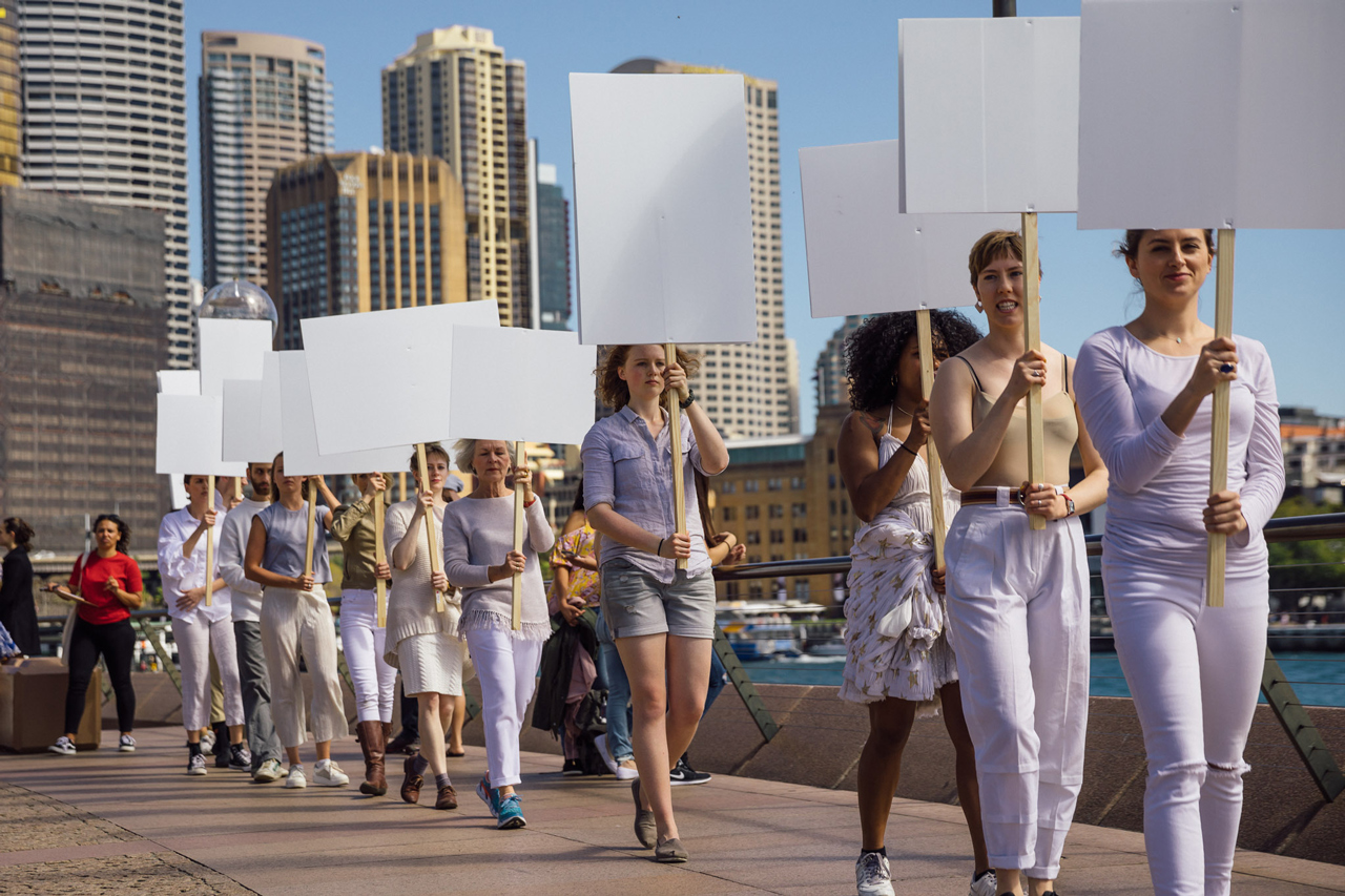 Blank placard dance, replay